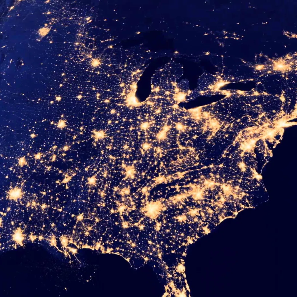 Satellite view of city lights across the United States at night